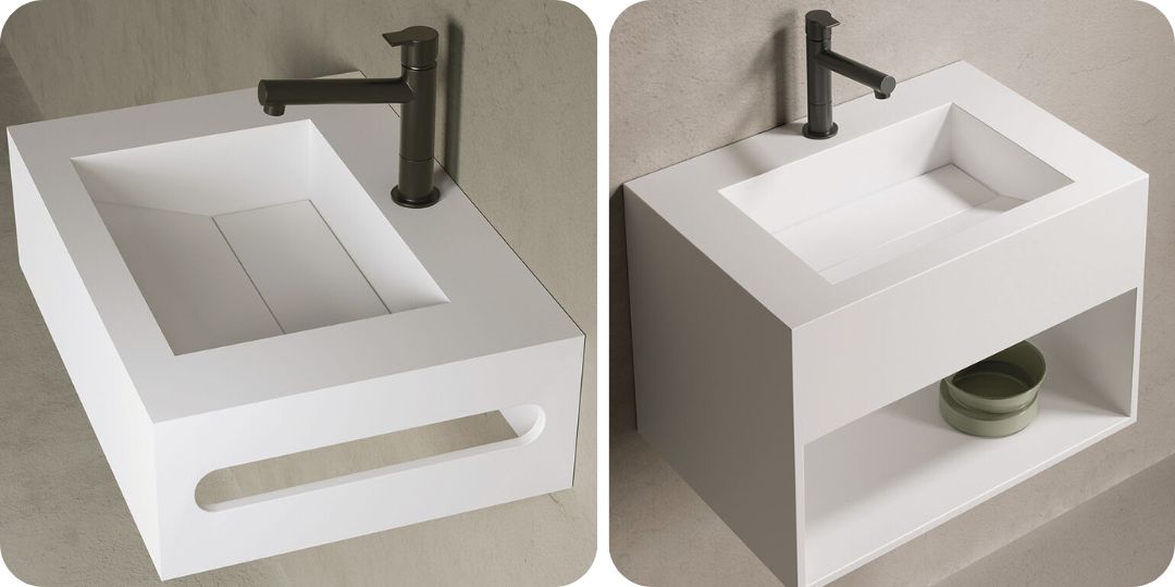 Lavabos suspendidos de resina blanca, uno con toallero integrado y otro con espacio de almacenamiento, acompañados de grifería negra.

